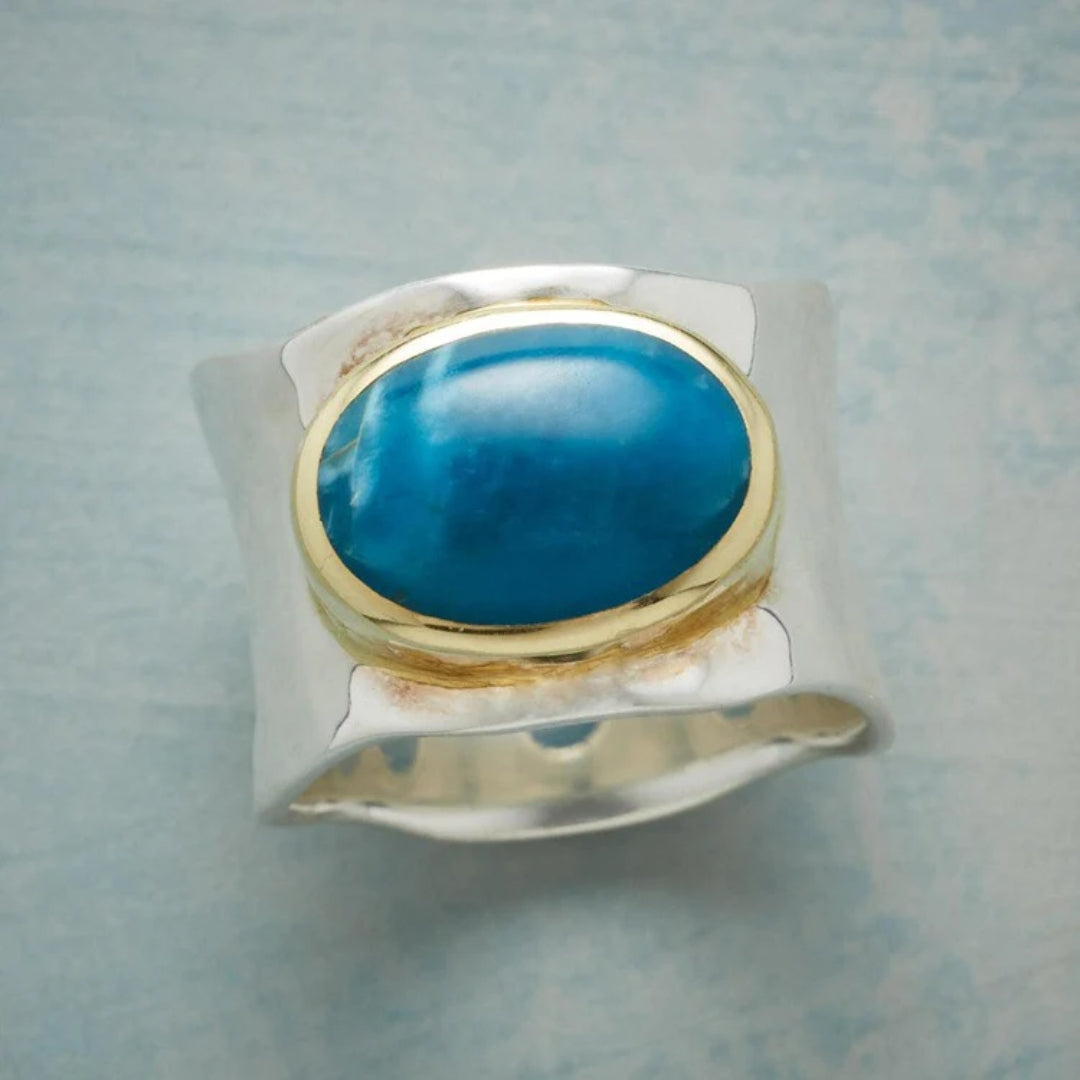 Bague en argent vintage avec pierre bleue ovale