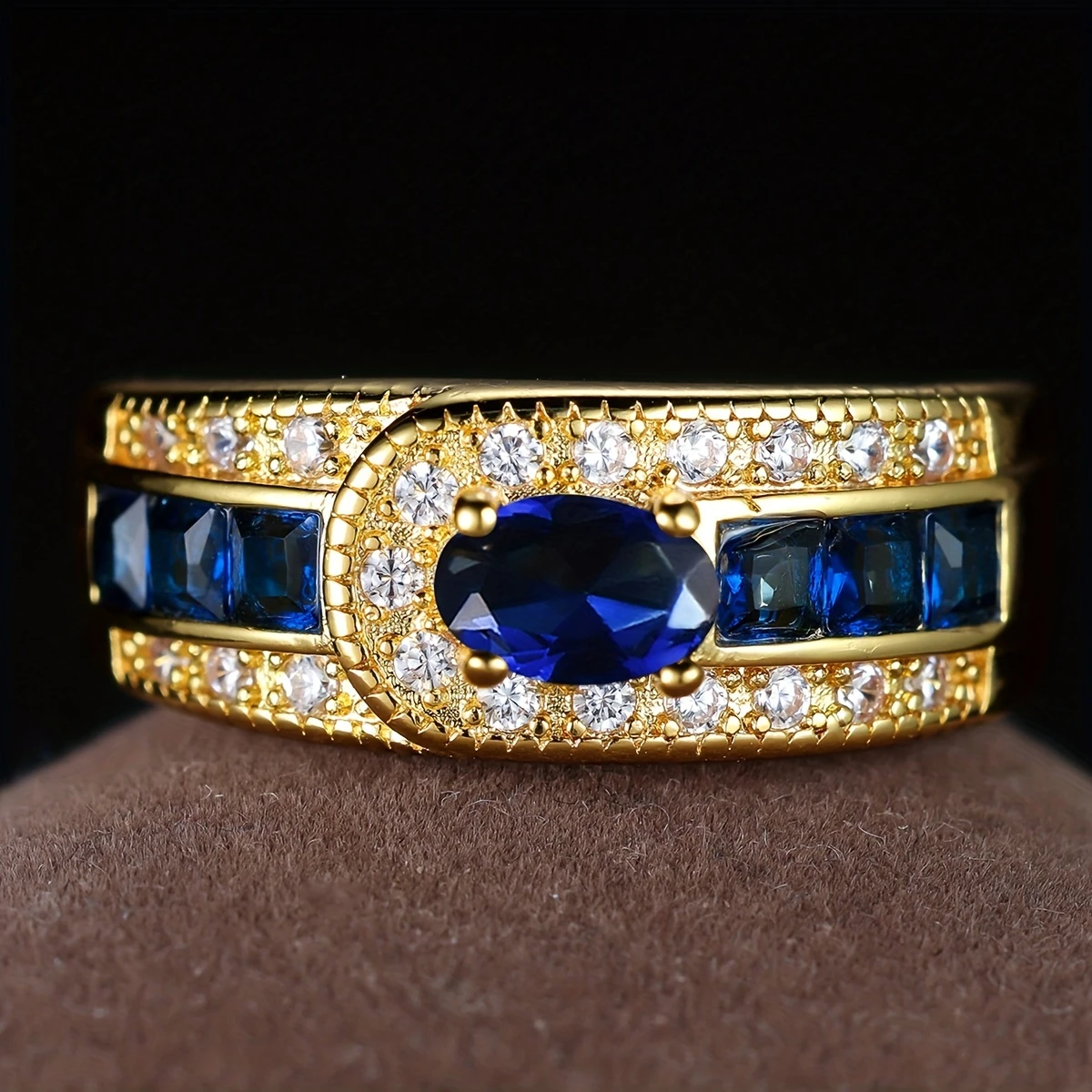Bague vintage Goldring avec zirconia et pierres bleues