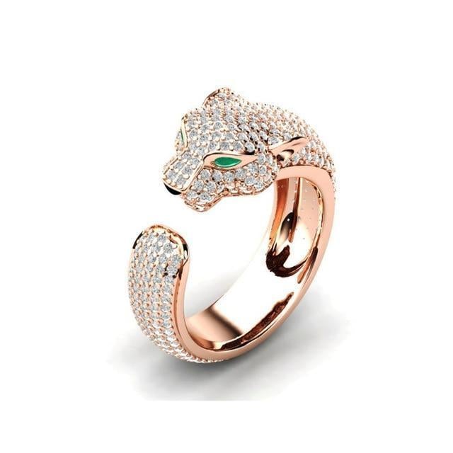 Bague réglable en argent et or rose 18 carats avec yeux en zircon vert