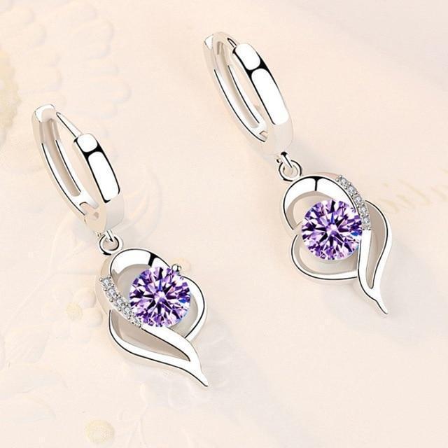 Boucles d'oreilles florales finition argent et zirconium