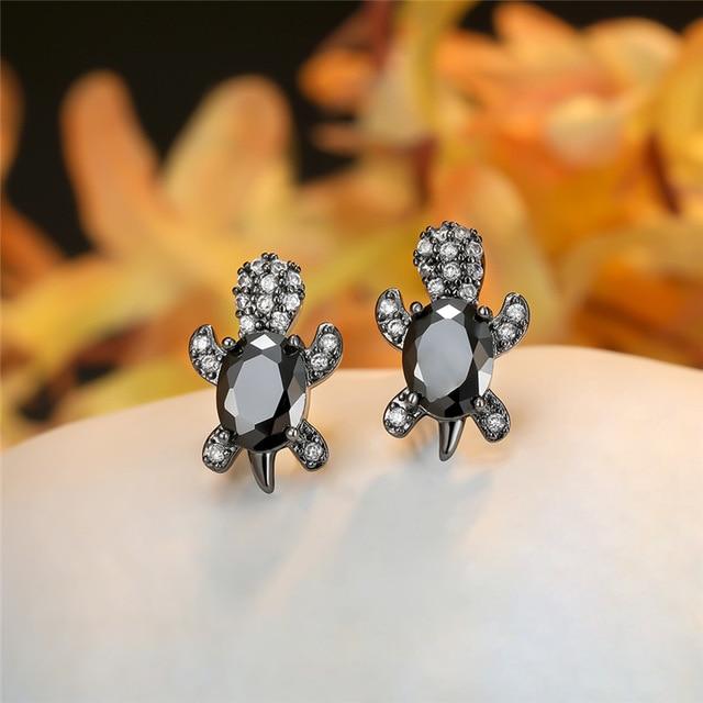 Boucles d'oreilles Tortue de mer en zirconium et finition argent