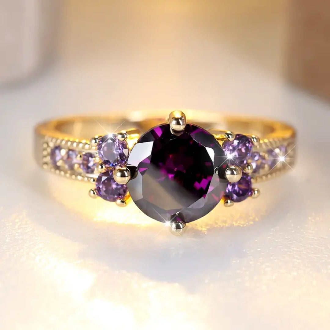 Bague en or avec cristaux violets