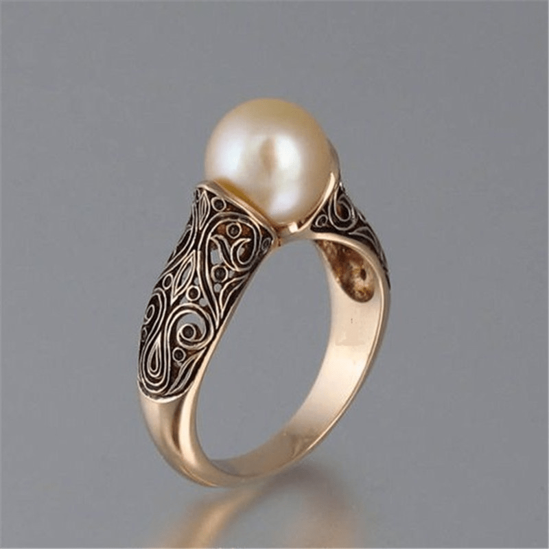 Bague vintage Goldring avec une belle perle
