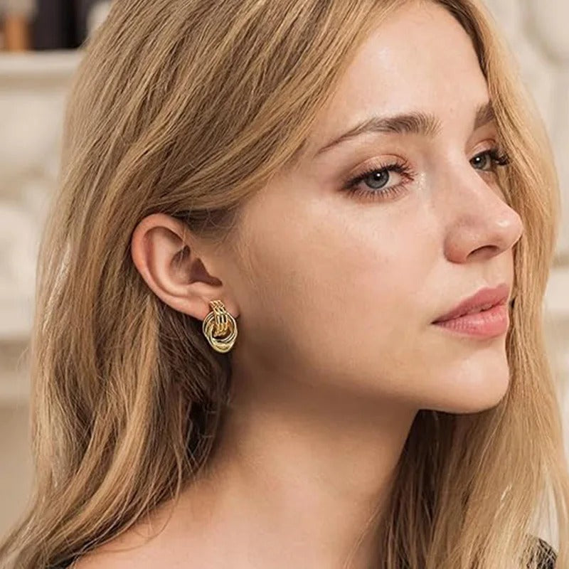 Boucles d’Oreilles Nœud Cercle plaqués or 18K