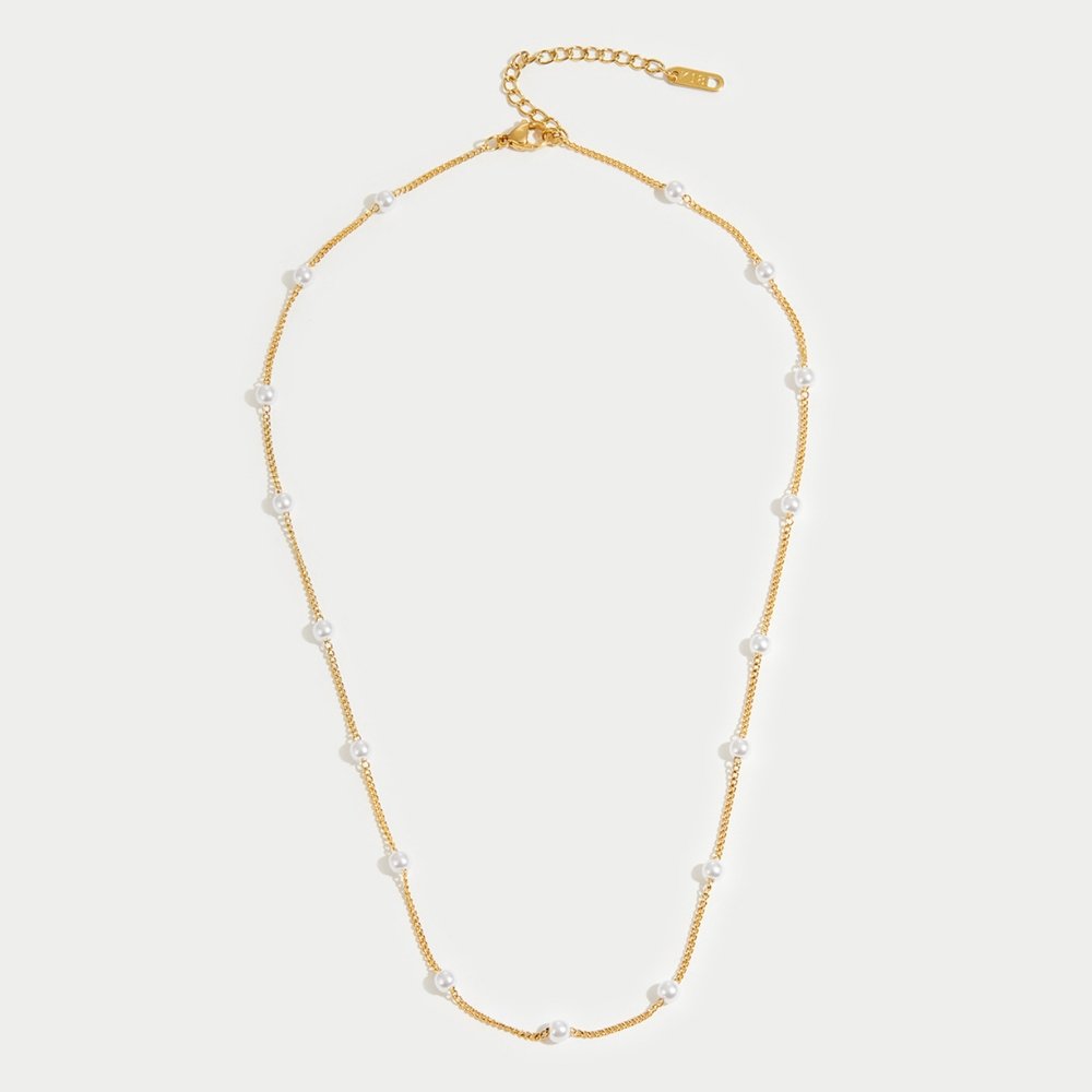 Collier Nura dorée avec effet Perle