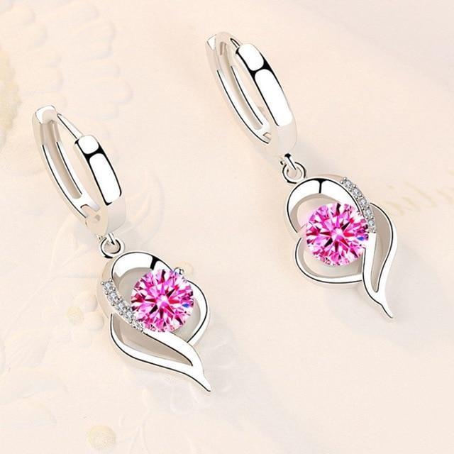 Boucles d'oreilles florales finition argent et zirconium